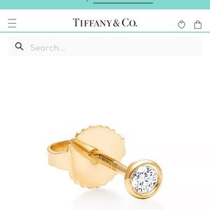 Single Tiffany diamonds by the yard yellow gold diamond stud earring